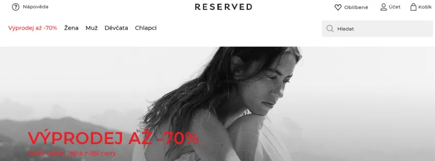 Úvodní stránka e-shopu Reserved.com s módními kolekcemi pro ženy, muže a děti, včetně kabátů, šatů, triček a doplňků
